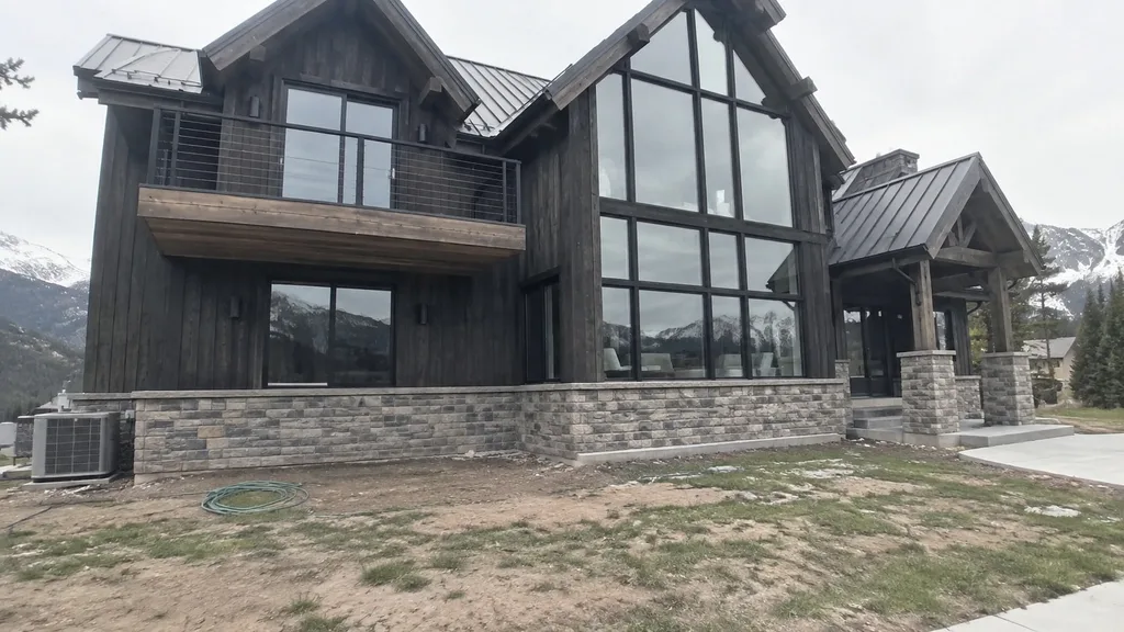 Alpine chalet, native drifts — the original photo