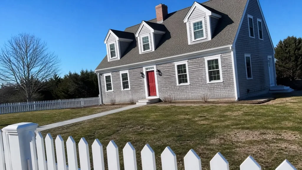 Cape Cod shingle cottage, blue hydrangeas — the original photo