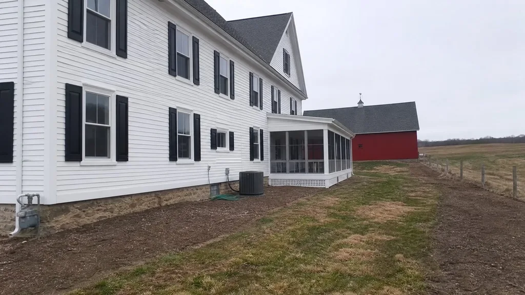 Clapboard farmhouse, meadow terrace — the original photo