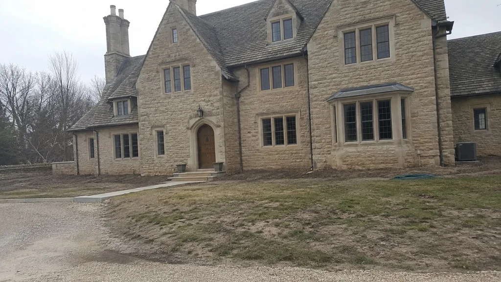 Cotswold manor, rose borders — the original photo