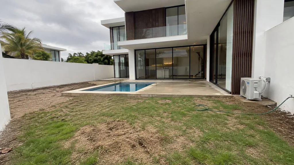 Island modern, tropical pool court — the original photo