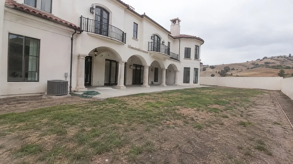 Mediterranean Revival villa, gravel garden — the original photo