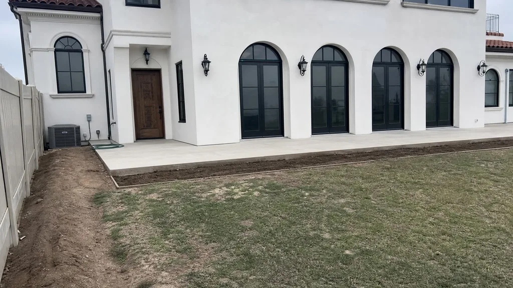 Spanish Revival villa, olive and gravel garden — the original photo