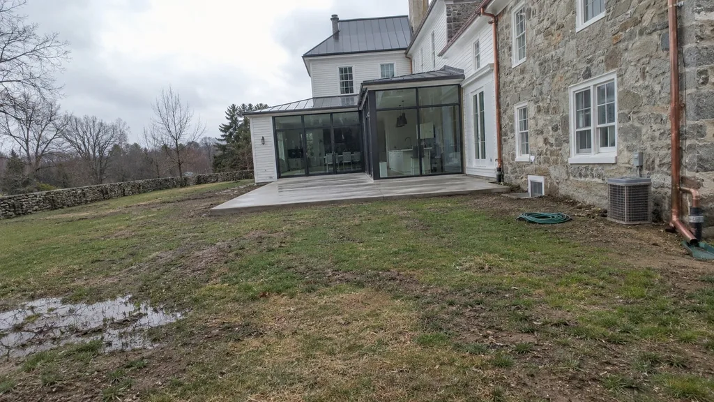 Stone farmhouse, back-yard rain garden — the original photo