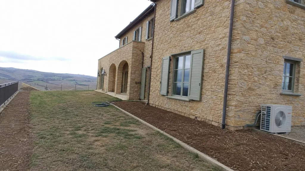 Stone villa, Tuscan courtyard — the original photo