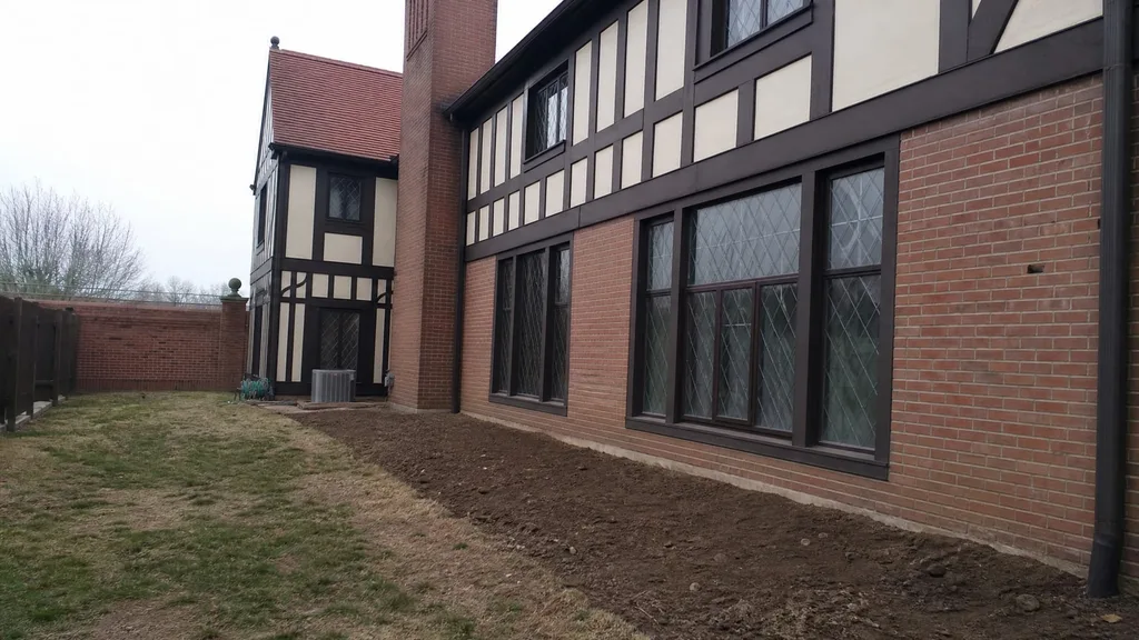 Tudor Revival house, climbing roses — the original photo