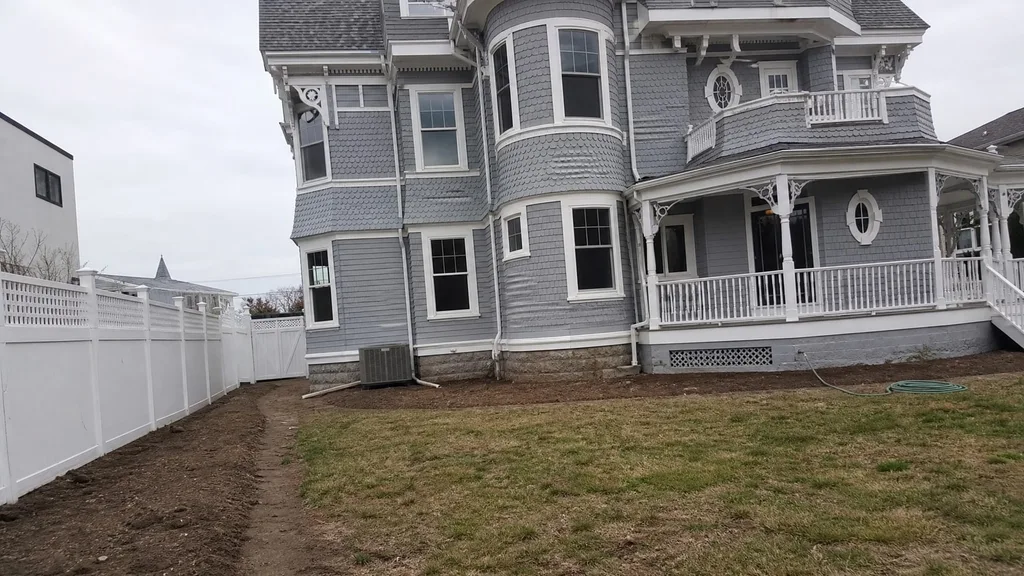 Victorian shingle house, hedged lawn — the original photo
